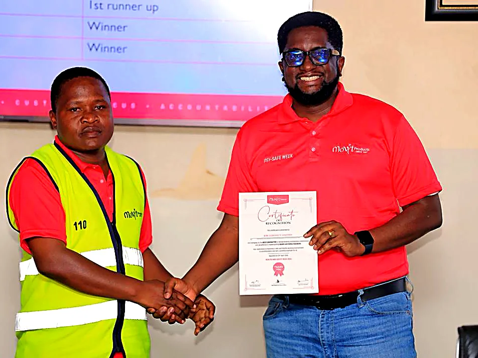 JCL team member receiving an award