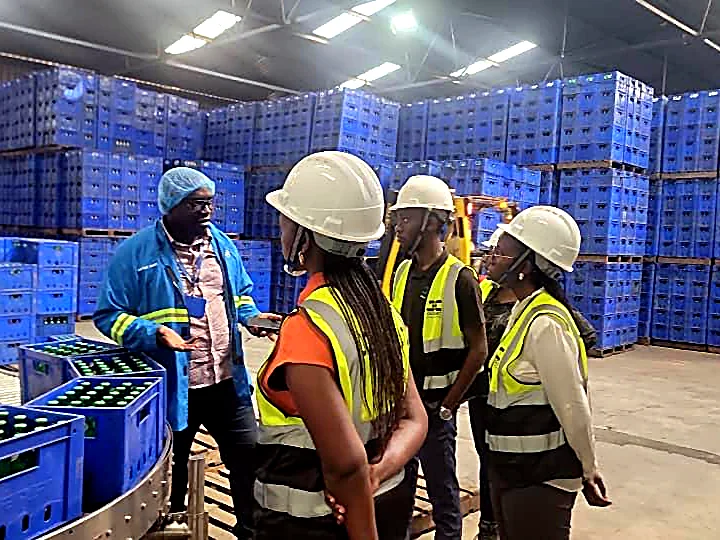 JCL supervisors and client staff reviewing operations on a warehouse floor